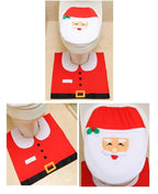 Weihnachtsmann-Motiv des 2er Bad-Sets: Klobrillenbezug mit Gesicht und Teppich als Anzug/Gürtel.