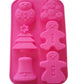 Pinke Silikon Backform mit 6 Weihnachtsmotiven: Schneemann, Teddybär, Weihnachtsbaum, Lebkuchenmann und Weihnachtsglocke.