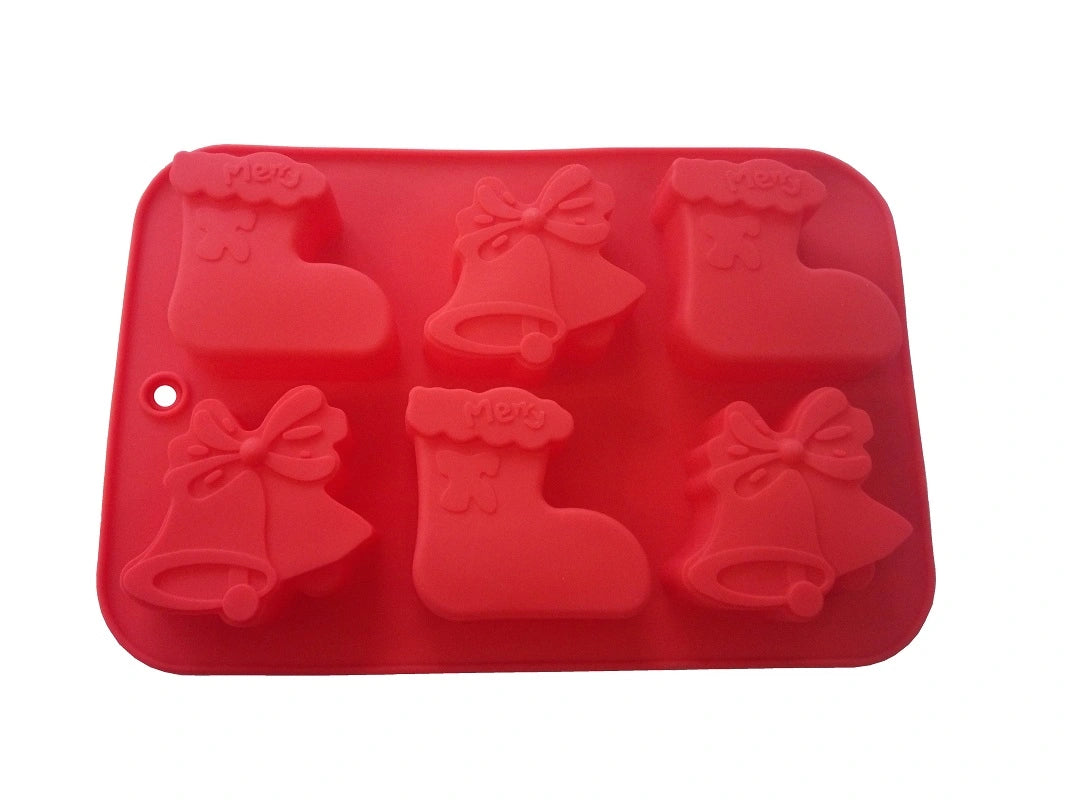 Hochwertige, lebensmittelechte Silikon-Giessform in leuchtendem Rot für festliche Leckereien in Form von Glocken und Strümpfen.