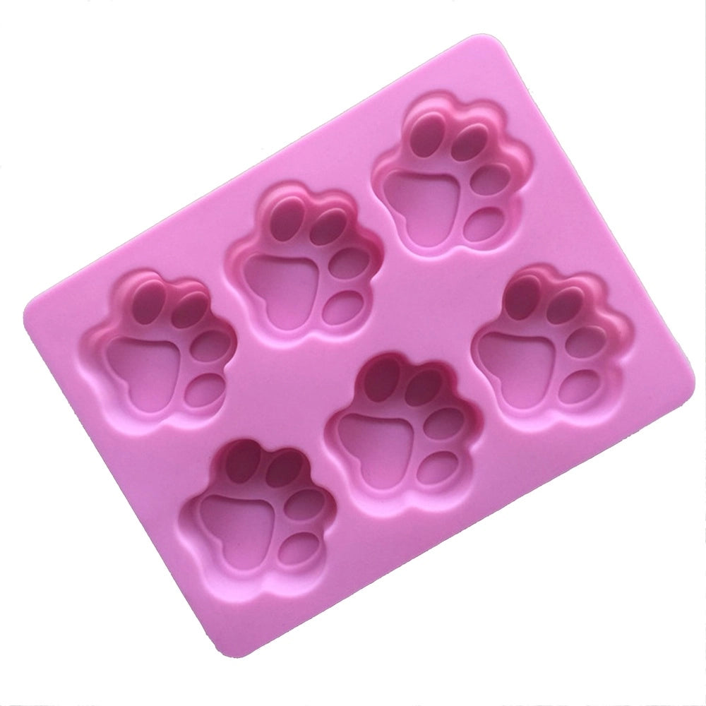 Backform Hundepfote pink 18.3 x 14 cm zur Herstellung von Leckerli oder Pralinen.